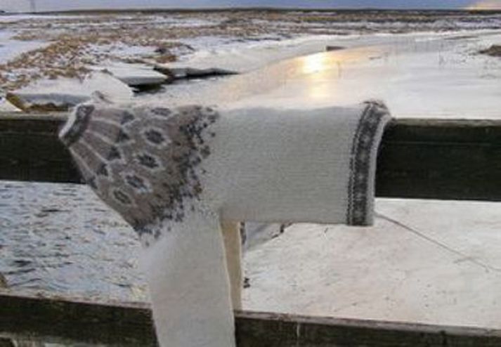 Með gríðarlegum fjárfestingum þakka kínverski auðjöfurinn fyrir lopapeysu á sinn máta.