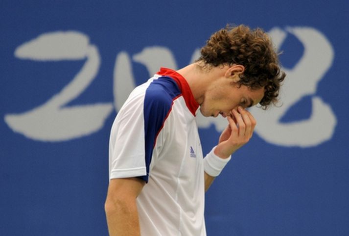 Andy Murray féll óvænt úr leik í Peking í dag.