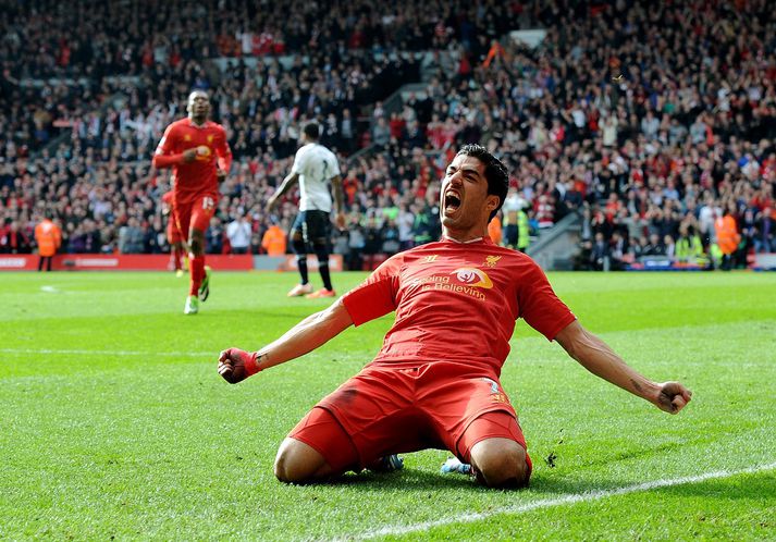 Suarez fagnar marki sínu um helgina.