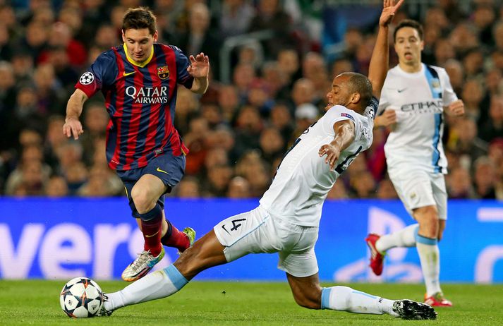 Lionel Messi fer framhjá Vincent Kompany í leik liðanna fyrr á þessu ári.