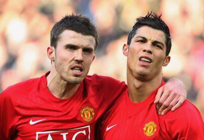 Cristiano Ronaldo ásamt félaga sínum Michael Carrick í leiknum gegn Everton í dag.