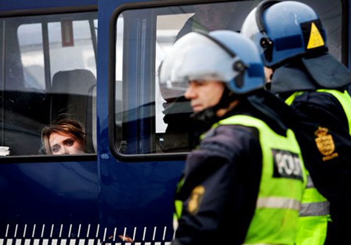 Lögreglan hefur handtekið fleiri hundruð manns í mótmælunum. Mynd/ AFP.