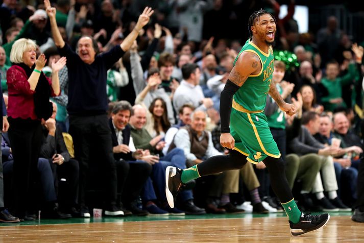 Marcus Smart fagnar hér einni af körfum sínum í sigri Boston Celtics í nótt.