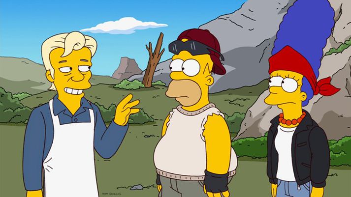 Assange ásamt Homer og Marge.