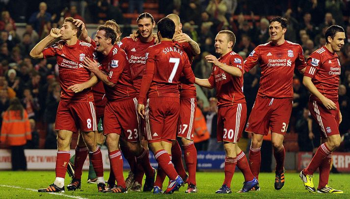Liverpool-menn fagna hér í kvöld.