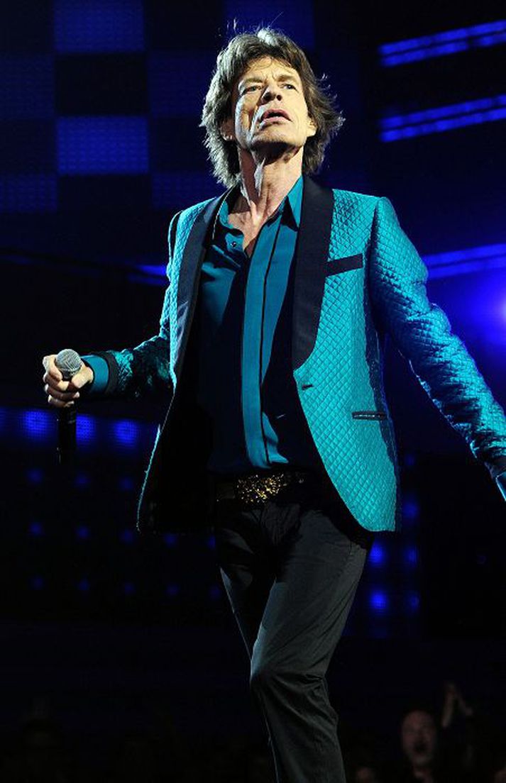 Eyddi degi með börnunum Mick Jagger kastaði mæðinni eftir tónleika með safnaferð ásamt börnum sínum. 
Nordicphotos/getty