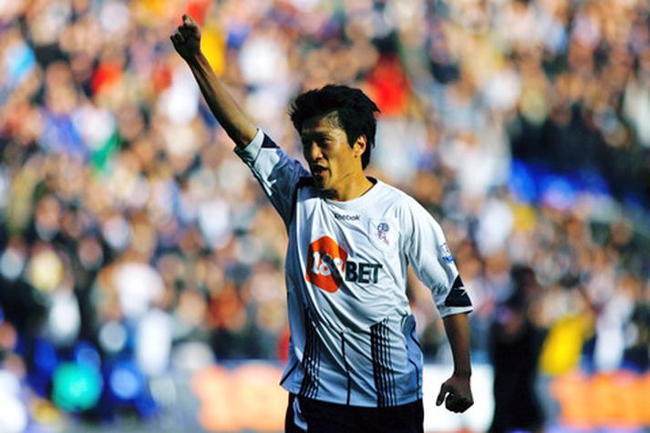 Chung-Yong Lee fagnar marki sínu í dag.