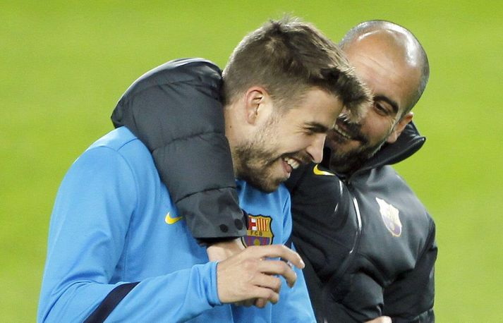 Pique og Guardiola á góðri stund.