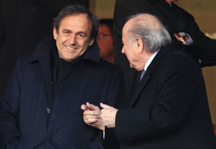 Michel Platini ásamt forseta FIFA, Sepp Blatter.