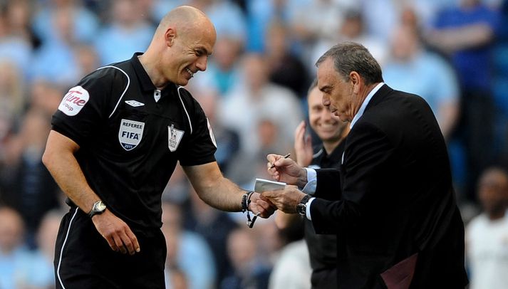 Avram Grant og Howard Webb.