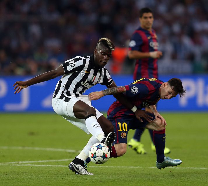 Paul Pogba er hér í baráttu við Lionel Messi í úrslitaleik Meistaradeildar Evrópu.