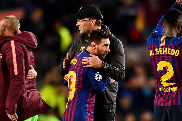 Jürgen Klopp og Lionel Messi eftir fyrri leikinn.