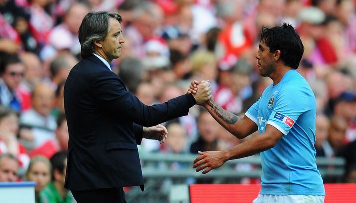 Roberto Mancini og Carlos Tevez.