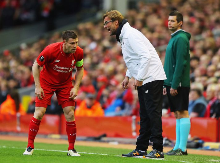 James Milner fær góð ráð frá Jürgen Klopp í gær.