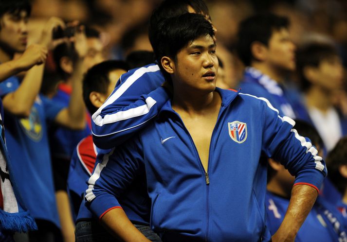 Stuðningsmaður Shanghai Shenhua.