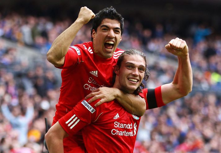 Carroll og Suarez fagna um síðustu helgi.