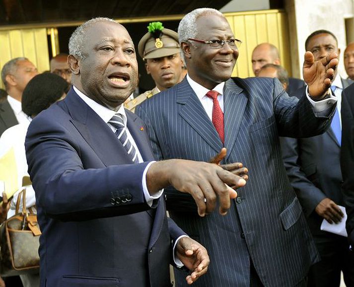 Gbagbo ásamt forseta Sierra Leone að loknum fundi þeirra á miðvikudag.
nordicphotos/AFP