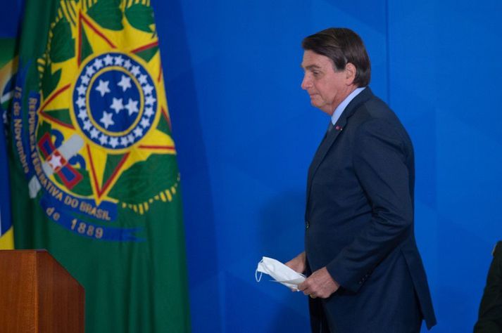 Forseti Brasilíu, Jair Bolsonaro, hefur verið sakaður um að gera lítið úr faraldrinum.