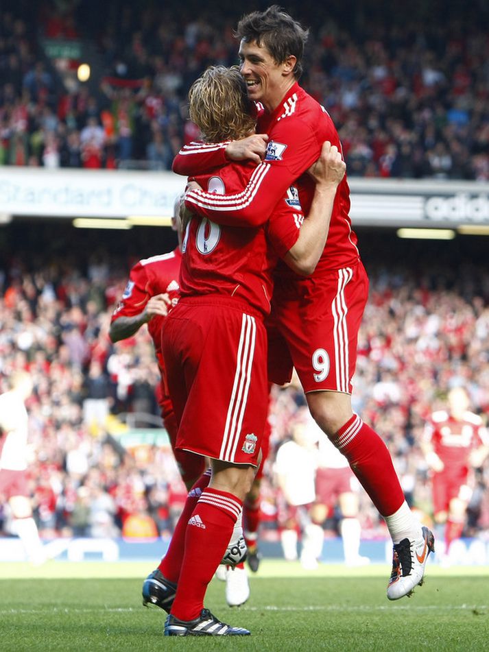 Dirk Kuyt og Fernando Torres fagna marki saman.