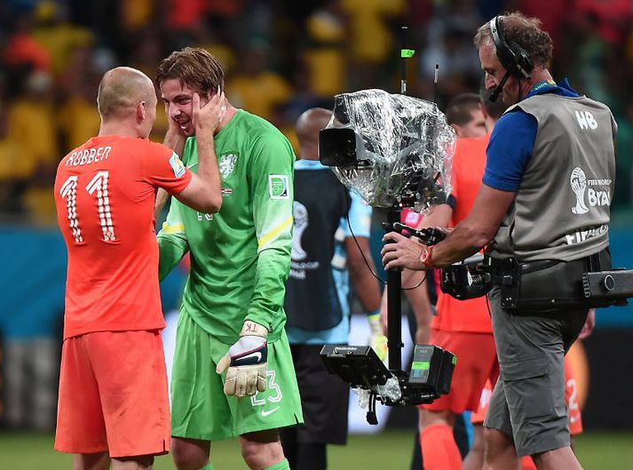 Arjen Robben og Tim Krul fagna í gærkvöldi.