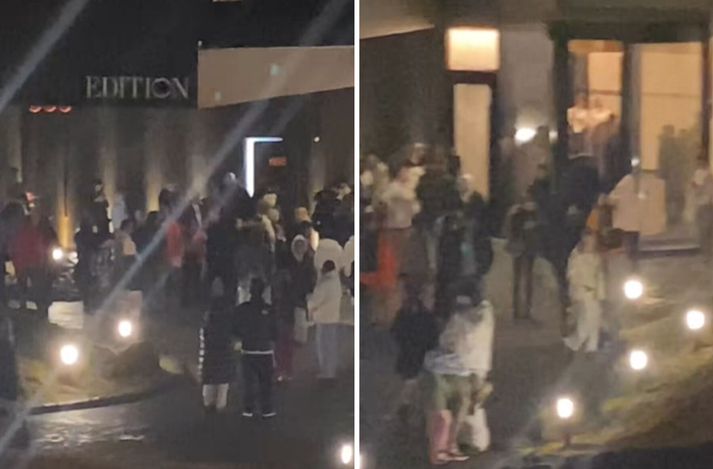 Gestir á Edition fyrir utan hótelið á meðan brunavarnakerfið vældi.