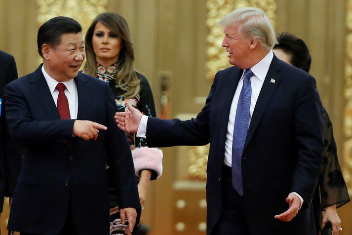 Trump og Jinping laufléttir síðasta föstudag.
