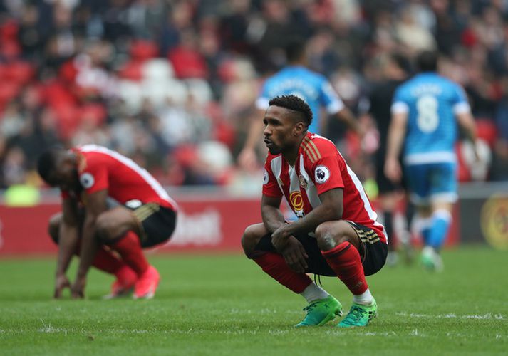 Jermain Defoe og félagar voru niðurlútir í leikslok.