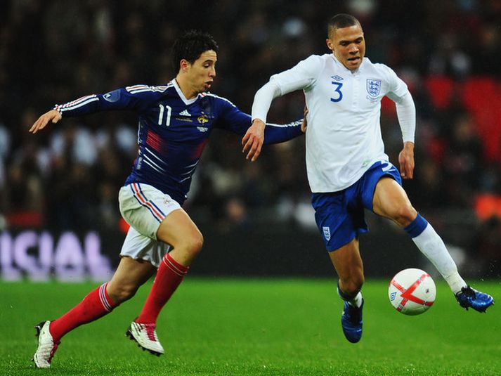 Kieran Gibbs fer hér framhjá Samir Nasri í leiknum í gær.