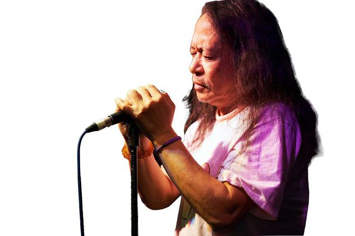 Damo Suzuki performs on stage at The Harley on December 9, 2010 in Sheffield, England.