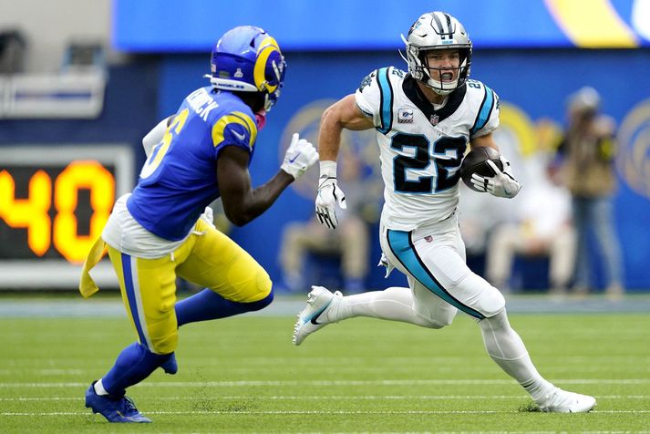 Christian McCaffrey sést hér á ferðinni með boltann í leik með Carolina Panthers.