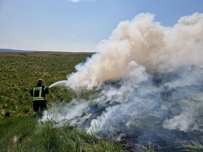Sinueldurinn braust út þar sem ábúandi hafði verið að brenna rusl
