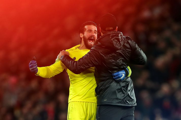 Alisson Becker með Jürgen Klopp.