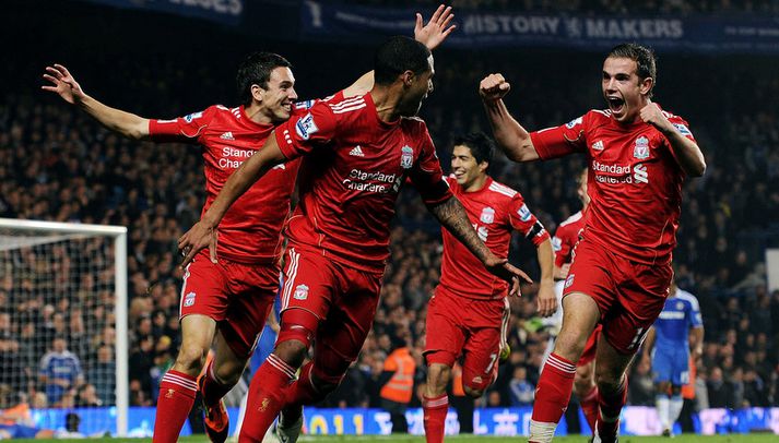 Liverpool-menn fagna sigurmarkinu á móti Chelsea um síðustu helgi.