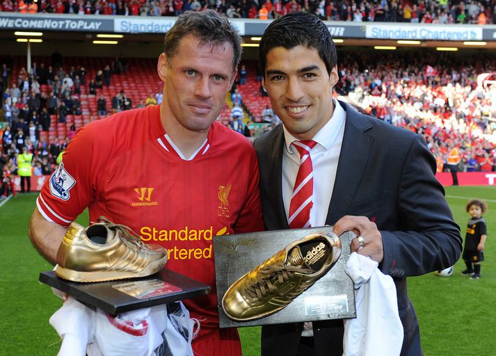 Jamie Carragher og Luis Suarez.