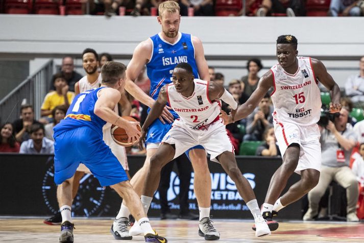 Martin Hermannsson og Tryggvi Snær Hlinason í baráttunni við þá Clint Capela og Boris Mbala.