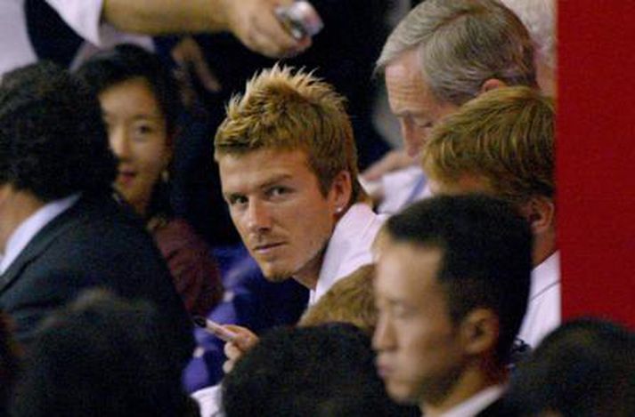 David Beckham sást aðstoða börnin sín við heimanám á dögunum. Mynd/ AFP.