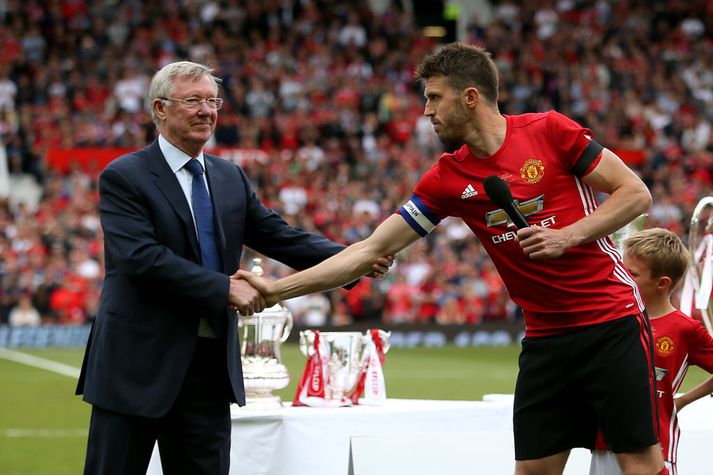 Sir Alex Ferguson og Michael Carrick fögnuðu fjölda titla saman.