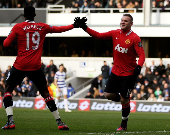 Rooney fagnar marki sínu sem kom eftir 51 sekúndu.