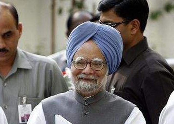 Manmohan Singh Forsætisráðherra Indlands er að vonum hæstánægður með sigurinn í kosningunum.mynd/ap