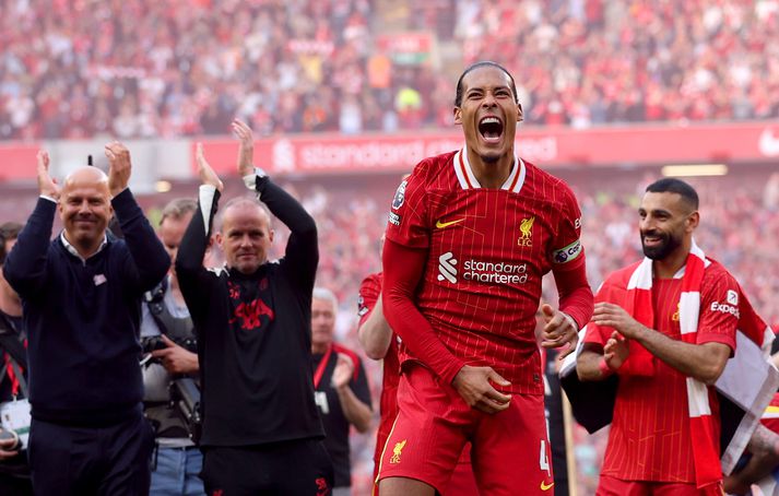 Liverpool FC v Tottenham Hotspur FC - Premier League LIVERPOOL, ENGLAND - APRIL 27: Virgil van Dijk of Liverpool celebrates the teams victory and confirmation of winning the Premier League title in the Premier League match between Liverpool FC and Tottenham Hotspur FC at Anfield on April 27, 2025 in Liverpool, England. (Photo by Carl Recine/Getty Images)