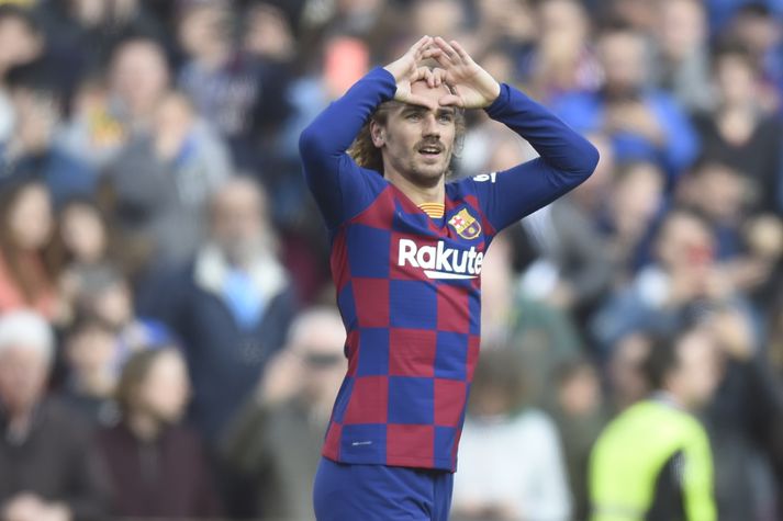 Griezmann fagnar marki sínu í dag.