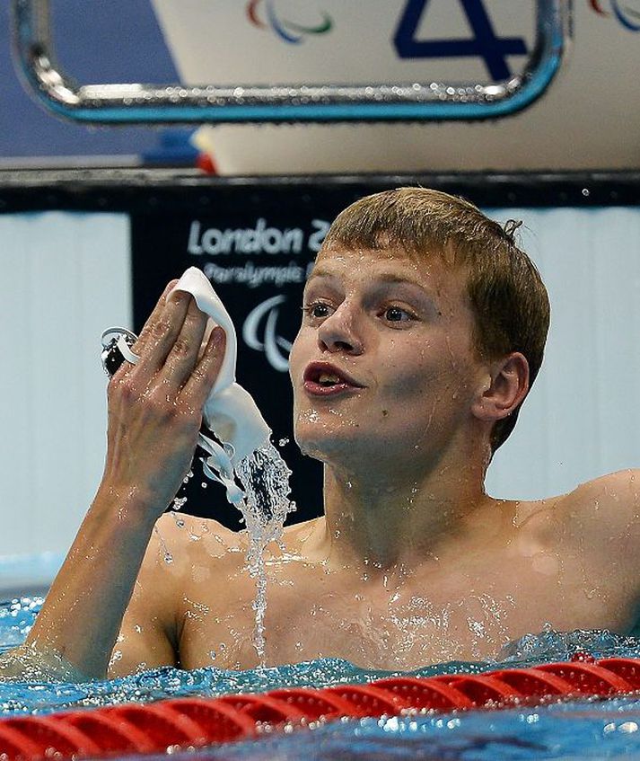 Jón Margeir kom í fyrstur í mark í 200 metra skriðsundi á nýju heimsmeti, 1:59,62 mínútum. Hann fagnaði að vonum vel. NordicPhotos/Getty