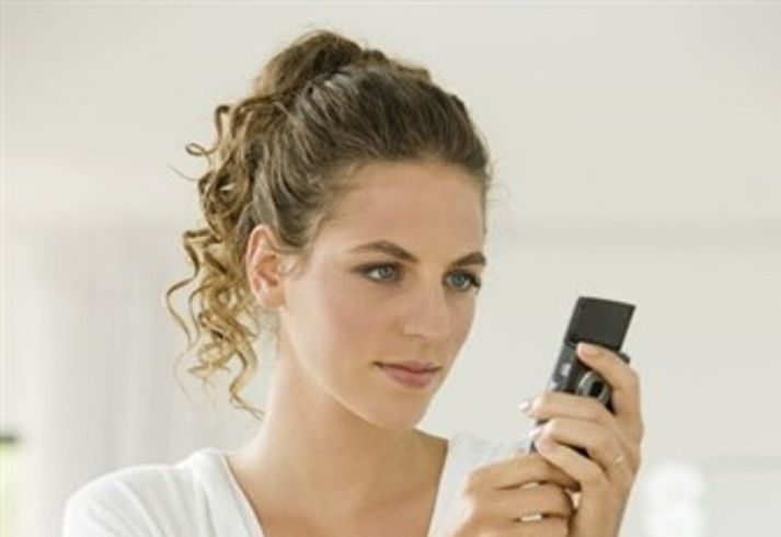 Það getur verið gott að senda sms. Mynd/ afp.