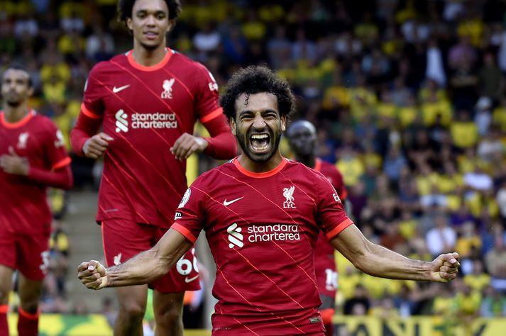 Mohamed Salah fagnar sögulegu marki sínu á móti Norwich City en hann varð þá fyrstur til að skora í fyrstu umferð ensku úrvalsdeildarinnar fimm ár í röð.