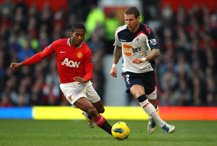 Grétar Rafn í baráttu við Antonio Valencia í leik Bolton Wanderers og Manchester United.