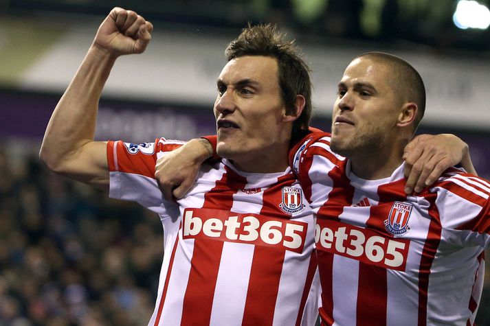 Dean Whitehead hér til vinstri