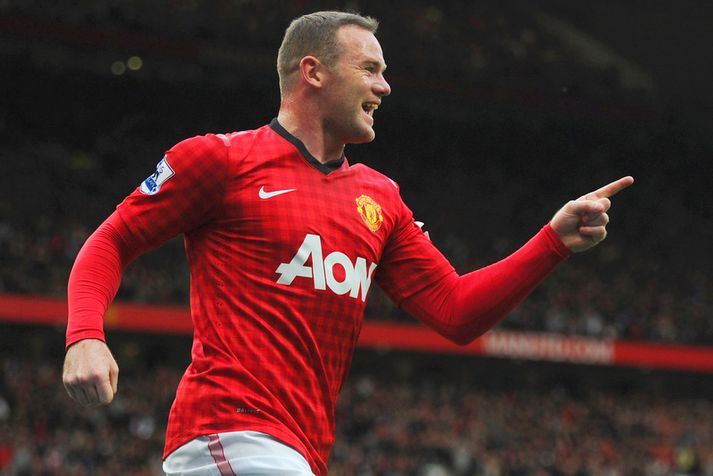 Wayne Rooney fagnar í dag.