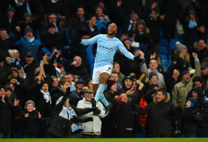 Raheem Sterling fagnar eftir að hafa skorað sigurmark City.