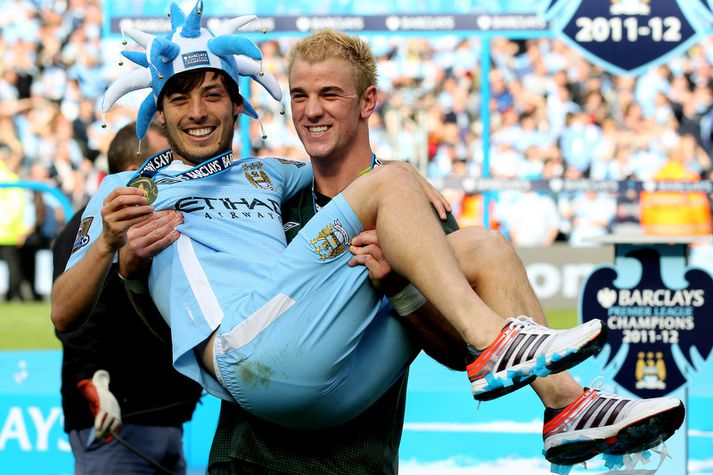 David Silva og Joe Hart fagna hér saman fyrsta Englandsmeistaratitli Manchester City í núverandi sigurgöngu en þetta var árið 2012.