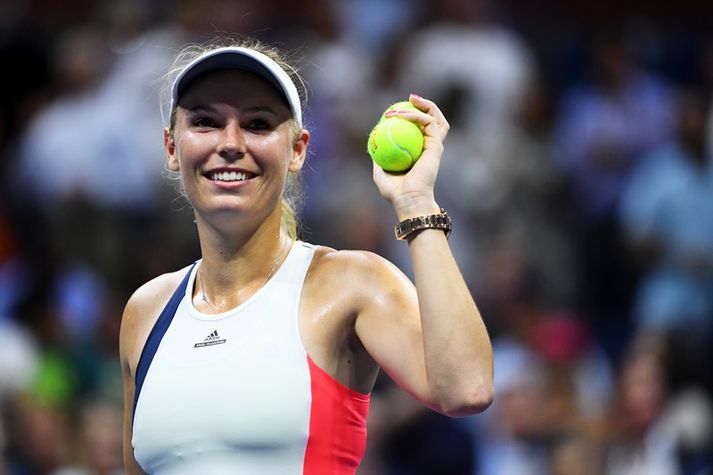 Wozniacki fagnar í nótt.